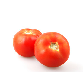 Close-Up Of Red Tomatoes On White Background.