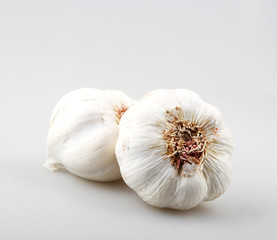 Close-Up Of Garlic Against Gray Background