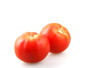 Close-Up Of Red Tomatoes On White Background.
