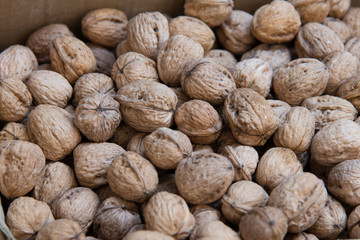 walnuts on market shelf.
