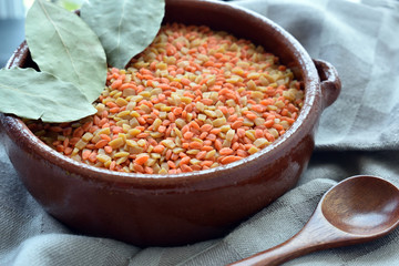 Red lentils with chickpeas on rustic bowl