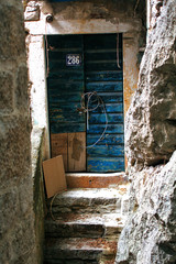Old blue door. Front door in the old house in Kotor