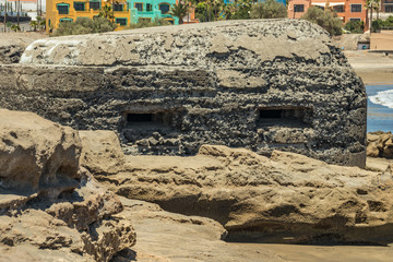 Outside detailed view of loophole of old military bunker on the south coast of El Medano. Tenerife,...