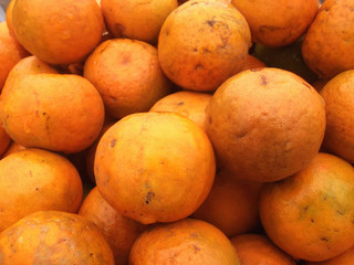 orange fruit bucket,Bhutan