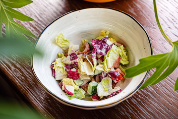 fresh summer salad with radish and cucumbers