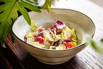 fresh summer salad with radish and cucumbers
