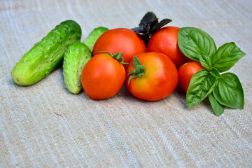 Fresh vegetables. Tomatoes, cucumbers, basil,