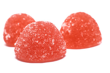 Red candied fruit jelly, isolated on white background