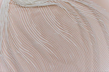 Texture lace fabric. lace on white background studio. thin fabric made of yarn or thread. a...