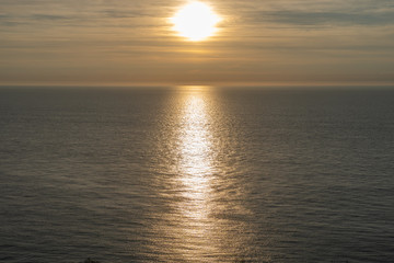 Obraz premium Etretat, France - 05 31 2019: sunset over the sea of Etretat