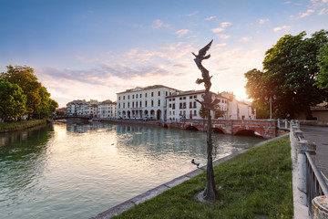 The street architecture in the centre of Treviso in sunset time