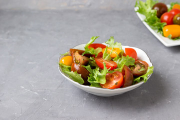 Snack from tomato and salad.