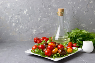 Fresh appetizer of lettuce and tomato.