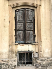 Fototapeta na wymiar Vintage old wooden shutters on window