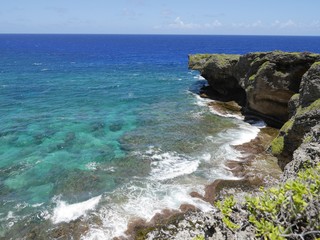 Rock formations and blue waters in a tropical island
