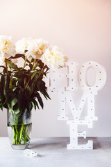 Bunch of amazing peonies in the vase