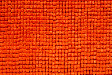 Orange textural background in the form of squares.