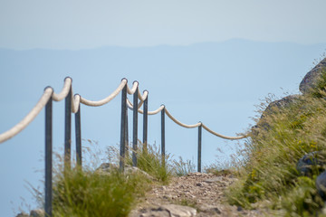 Stony road with rope fence on the peak Sv. Jure in Biokovo national park, Croatia