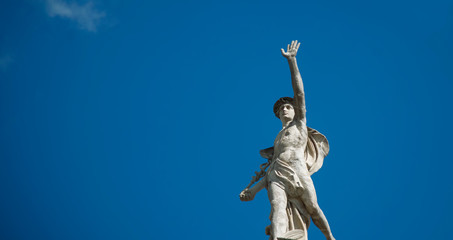 Ancient statue of the antique god of commerce, merchants and travelers Hermes (Mercury).