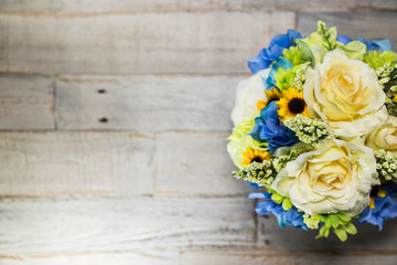 Floral Arrangment on Distressed Wood Surface Right Side