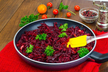 Dietary dishes. Stewed beet in frying pan