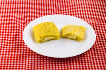 Pamonha, Brazilian sweet corn with cheese filling. Pamonha typical of Brazil, food of the state of minas gerais and goiais. Concept of traditional food. Brazilian food at rural parties
