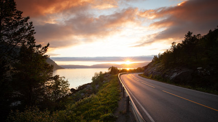 Early morning. Sunrise brightens road. © Seonphoto SergeiGo.