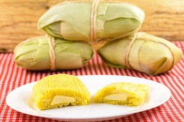 Pamonha, Brazilian sweet corn with cheese filling. Pamonha typical of Brazil, food of the state of minas gerais and goiais. Concept of traditional food. Brazilian food