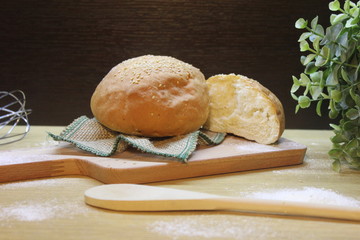 Fototapeta na wymiar bread on wooden table