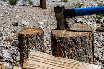 ax slammed into log