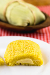 Pamonha, Brazilian sweet corn with cheese filling. Pamonha typical of Brazil, food of the state of minas gerais and goiais. Concept of traditional food. Brazilian food