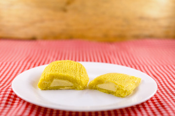 Pamonha, Brazilian sweet corn with cheese filling. Pamonha typical of Brazil, food of the state of minas gerais and goiais. Concept of traditional food. Brazilian food