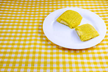 pamonha, Brazilian sweet made from homemade cheese with corn. Open pissing ready for consumption....