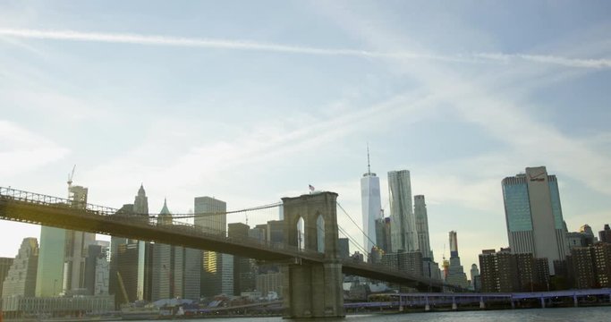 Brooklyn Bridge and Iconic New York Skyline In the Classic Financial District On Hudson River And Impressive World Trade Centre