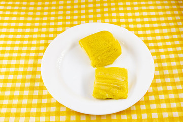 pamonha, Brazilian sweet made from homemade cheese with corn. Open pissing ready for consumption....