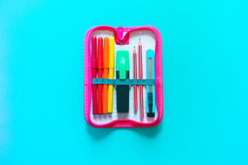 Stationery flat lay. Pencil case with pens and pencils. Back to school.