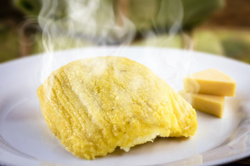 Curau or sweet of hot mushroom, with smoke after being cooked. Sweet cheese with corn made in Brazil, typical of the rural festivals of the state of minas gerais and goiais. Brazilian regional food.