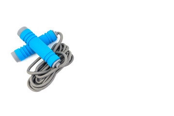 Skipping rope or jumping rope isolated on white background. Selective focus and crop fragment