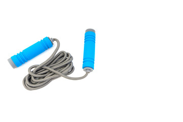 Skipping rope or jumping rope isolated on white background. Selective focus and crop fragment