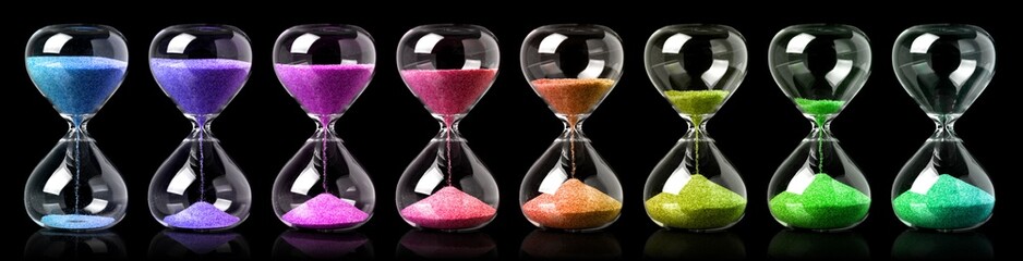 Collection of colorful hourglasses showing the passage of time - obrazy, fototapety, plakaty