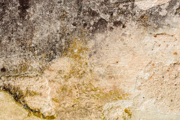 Texture of a concrete wall with cracks and scratches which can be used as a background