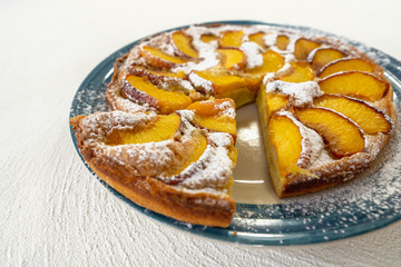 Peach Cake, Homemade Dessert with Fresh Fruits Close Up on White Background.