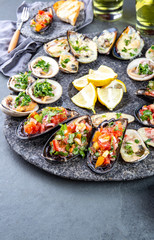 Seafood assorted platter Macha and mussels a la parmesana, mussels a la chalaca, clams with herb sauce