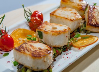 Fried Fish With Caramelized Orange And Cherry Tomatoes