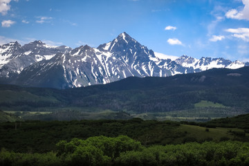 Mt Wilson's Snowy Peaks and Green Valley Below - Colorado