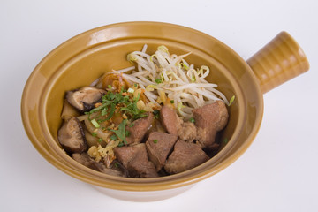 Stewed pork soup with morning glory and bean sprout.