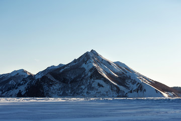 Tikhaya bay and Smeliy Peak in winter, Sakhalin island