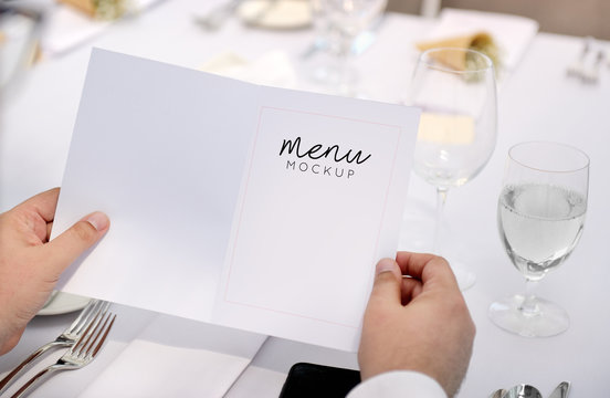 Restaurant Wedding Chilling Out Classy Lifestyle Concept. Restaurant with the menu in hands. Menu mockup.