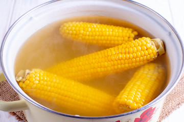 Boiled corn in a boiler