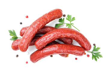Smoked sausages with spice and parsley.isolated on white background